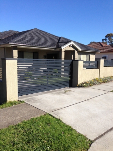 Automatic sliding driveway gates slats Sydney